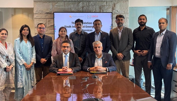 Officials pose for photo after signing the MOU between TF and SIEHS on November 15, 2024. — Facebook@TharFoundationSECMC