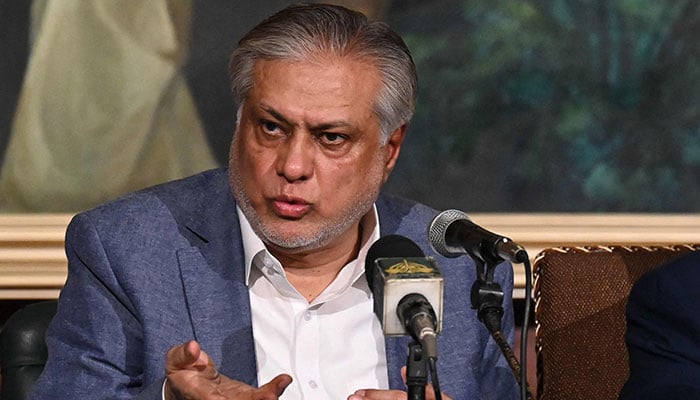 Deputy Prime Minister and Foreign Minister Ishaq Dar addresses a press conference in Lahore on June 30, 2023. — AFP