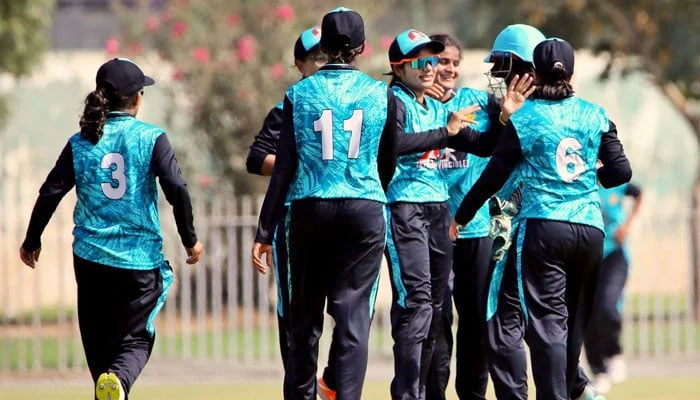 Members of team Invincibles celebrate after taking a wicket of team Stars in their second round match of the National Womens One-Day Tournament at the UBL Sports Complex, Karachi on November 10, 2024. — PCB