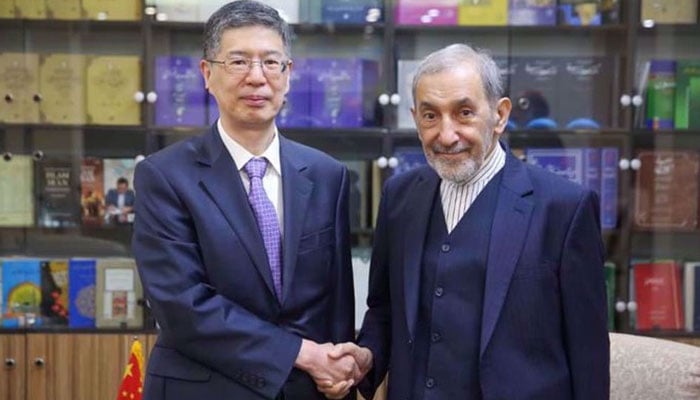 Ali Akbar Velayati (right), a senior advisor to Leader of the Islamic Revolution Ayatollah Seyyed Ali Khamenei, shakes hands with Chinas Ambassador to Tehran Cong Peiwu on November 17, 2024. — Press TV Website