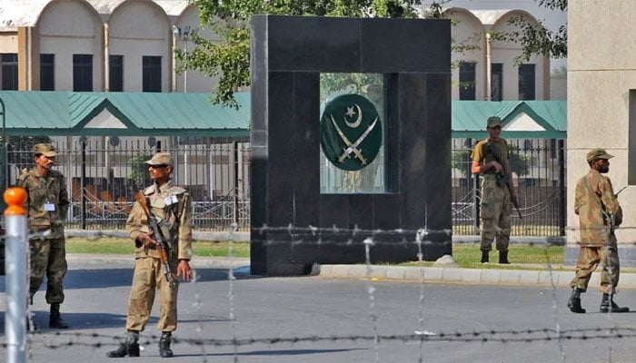 Pakistani soldiers guard the main entrance to the army headquarters in Rawalpindi, Pakistan, in this file photo. — AFP/File