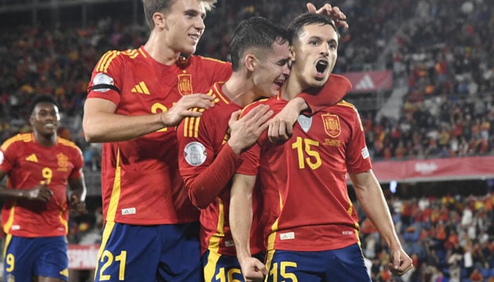 Bryan Zaragoza (right) celebrates scoring his teams third goal in the win over Switzerland. — AFP/file