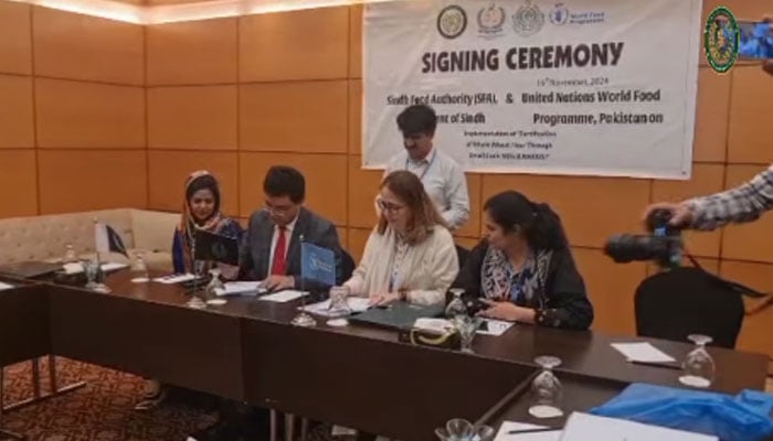 Officials are signing an MOU during the signing ceremony between the SFA and the WFP on November 19, 2024. — Screengrab via Facebook@SindhFood