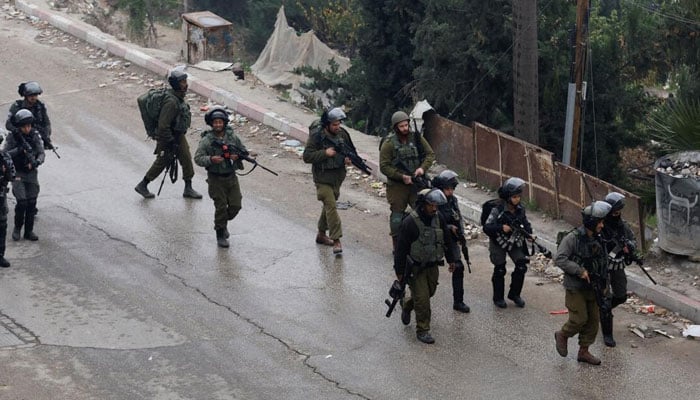 Israeli troops near Hebron, in the Israeli-occupied West Bank, on November 29, 2022.— Reuters