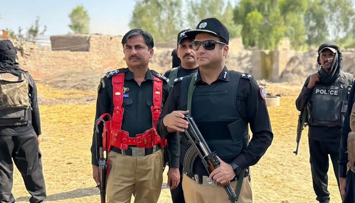 This representational image shows Sindh Police personnel standing guard at an undisclosed area. — Facebook@sindhpolicedmc/file