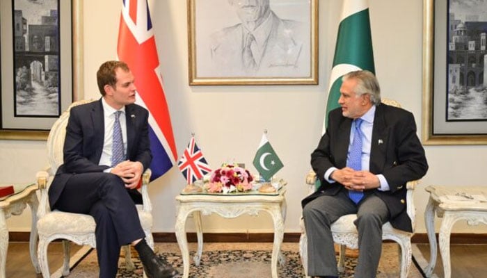 UKs Parliamentary Under Secretary of State for Middle East, North Africa, Afghanistan and Pakistan, Hamish Falconer ( left) met Deputy Prime Minister and Foreign Minister Senator Ishaq Dar. — APP/file