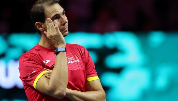 Spains Rafael Nadal cries as he attends a tribute to his career after Davis Cup elimination.— AFP/file