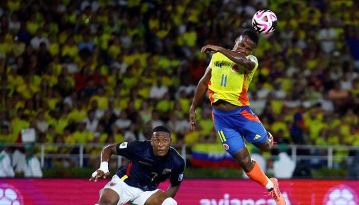 Colombias Jhon Arias (right) in action with Ecuadors Pervis Estupinan. — Reuters/file