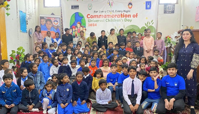 Children pose for a group photo during Universal Children’s Day under the theme ‘For Every Child, Every Right’ on November 20, 2024. — Facebook@AwazCDS-Pakistan