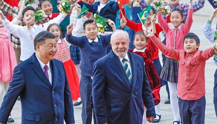 Chinese President Xi Jinping (left) and his Brazilian counterpart Luiz Inacio Lula da Silva at the Great Hall of the People in the capital Beijing for a bilateral meeting on April 14, 2023. —X@LulaOficial/File