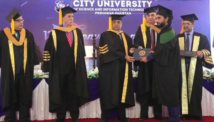 KP Chief Secretary Nadeem Aslam Chaudhry awards a degree to a student during the 13th Convocation ceremony of the CUSIT Peshawar on November 21, 2024. — Screengrab via Facebook@CUSIT