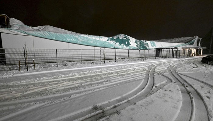 A collapsed sports hall is pictured after it caved in under the weight of wet snow in Espoo, Finland, on November 20, 2024, during Storm Jari. — AFP