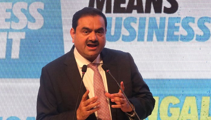 Indian billionaire Gautam Adani addresses delegates during the Bengal Global Business Summit in Kolkata, India on April 20, 2022. — Reuters