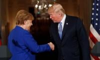 Trump ‘fascinated’ by dictators, Merkel says in memoirs