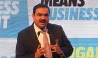 Indian tycoon Adani’s empire sinks by $20bn after US indictment on fraud charges