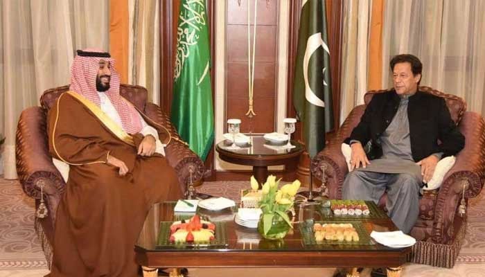 PTI founder and ex-PM Imran Khan (right) meets Saudi Crown Prince Mohammed bin Salman in this undated image. — X@GovtofPakistan/file