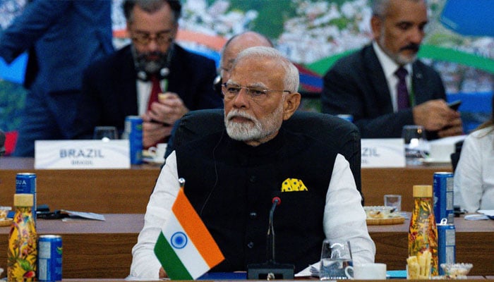 Indian Prime Minister Narendra Modi listens as President Joe Biden, not pictured, delivers remarks during an event launching the Global Alliance Against Hunger and Poverty at the G20 Summit at the Museum of Modern Art in Rio de Janeiro, Brazil on Monday, Nov. 18, 2024. — Reuters