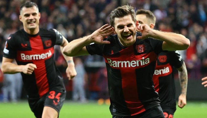 Jonas Hofmann (right) celebrates after opening the scoring for Leverkusen. — Reuters/File