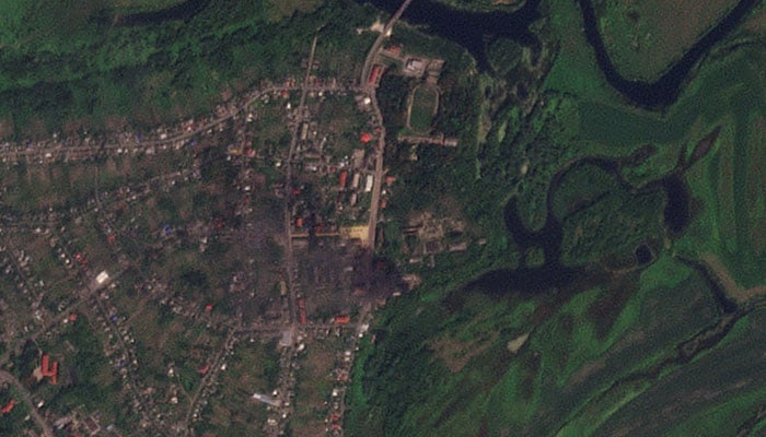 View of smoke rising from buildings that were purportedly struck by Ukrainian forces, amid their ongoing incursion, in Glushkovo, Kursk region, Russia on  August 21, 2024 in this satellite image.— Reuters