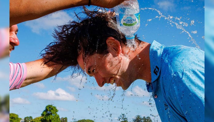 Australias Elvis Smylie (right) celebrates after winning the Australian PGA Championship in Brisbane. — AFP/file