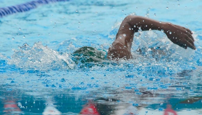 A representational image showing a swimmer in a pool. — Pexels/File