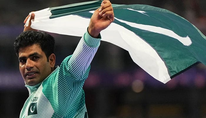 Pakistans javelin ace Arshad Nadeem celebrates after winning gold medal, Paris 2024 Olympics, Mens Javelin Throw Final, Stade de France, Saint-Denis, France, August 08, 2024. — Reuters