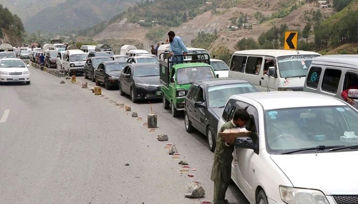 A view of stranded vehicles queued up amid traffic. — Online/File