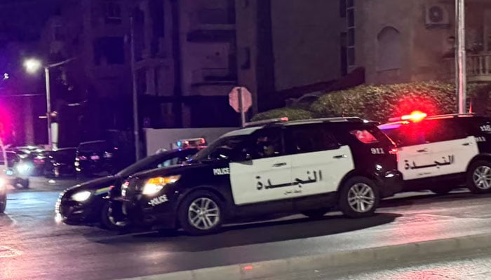 Police vehicles on a street near the Israeli embassy in Amman, Jordan on  November 24, 2024. — Reuters