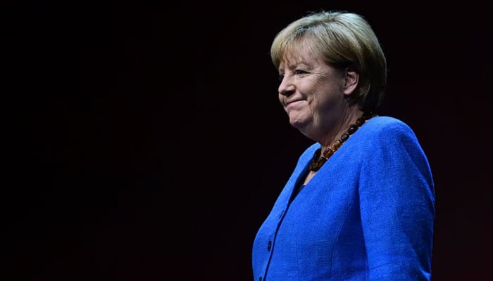 Former German Chancellor Angela Merkel arrives on stage for her first public interview since stepping down, at the Berliner Ensemble theatre in Berlin. — AFP/File