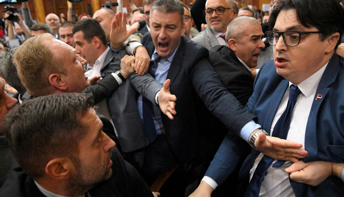 Opposition and the ruling coalition deputies brawl as tensions rose over Novi Sads fatal train station roof collapse, during a session in the Serbian parliament hall in Belgrade, Serbia on November 25, 2024.— Reuters