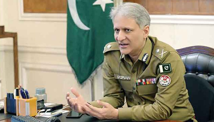 Inspector General Police (IGP) Punjab Dr Usman Anwar gestures as he speaks in a meeting at his office. — APP/File