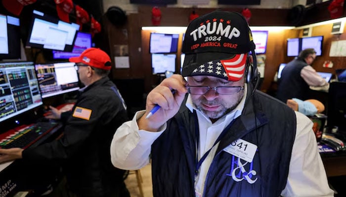 A trader wears a hat in support of Republican Donald Trump, after he won the US presidential election, at the New York Stock Exchange (NYSE) in New York City, US on November 6, 2024. — Reuters