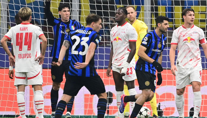 Castello Lukeba (centre) reacts to scoring the own goal which gave Inter Milan victory over Leipzig on November 27, 2024. —AFP