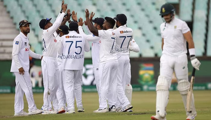 Sri Lankas cricket players can be seen celebrating. — AFP/File