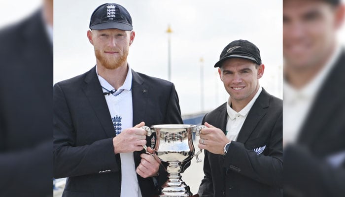 New Zealands Tom Latham (right) and Englands Ben Stokes pose with the series trophy. — AFP