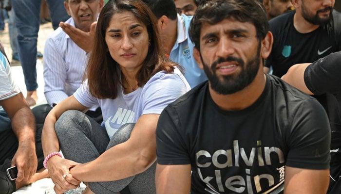 Indian wrestler Bajrang Punia (right) took part in protests against the Wrestling Federation of India last year. — AFP/File