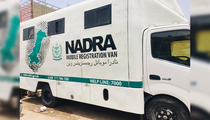 NADRA mobile van can be seen parked alongside a road. — Facebook@FixitAK/File