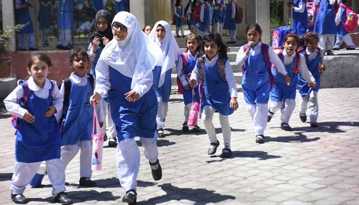 Students leave for their homes after school in Islamabad on May 10, 2023. — Online