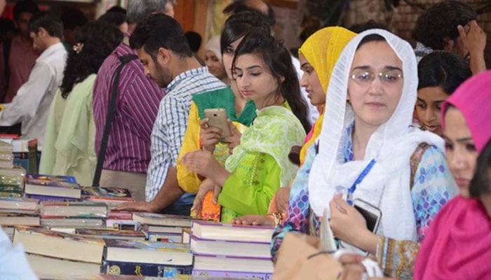 This representational image shows students visiting a book stall. — PU website/File