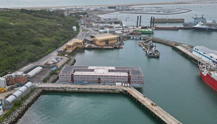 An aerial view shows the Bibby Stockholm barge moored at Portland Port, near Poole, Britain on August 7, 2023.— Reuters