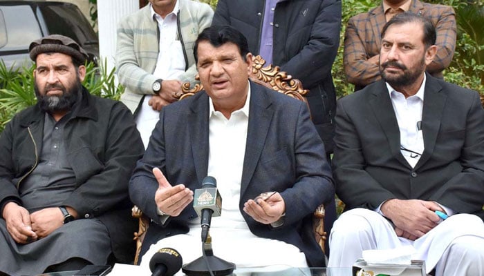 Federal Minister for Kashmir Affairs and Gilgit-Baltistan Amir Muqam Khan addresses a press conference at his residence on November 28, 2024. — APP