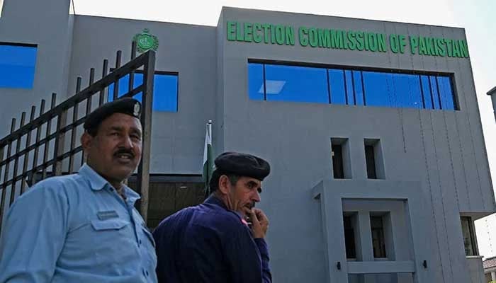 Security personnel stand guard at the headquarters of the Election Commission of Pakistan in Islamabad on September 21, 2023. — AFP