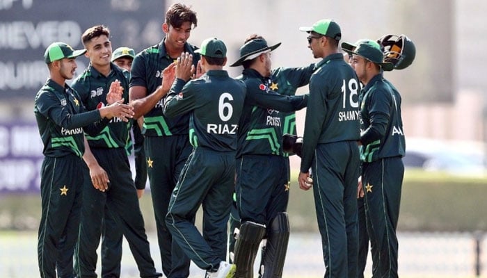 Pakistans Under-19 players celebrate during a match. — PCB website/file