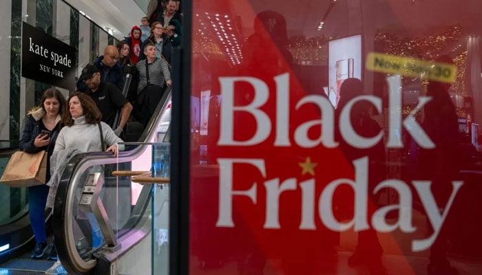 People shop in New York City during the Black Friday promotions on Friday.—AFP/File