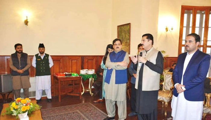 Governor KP Faisal Karim Kundi (second right) seen talking in this image.— Facebook@FazalBoXer/File