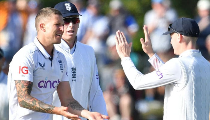 Englands Brydon Carse (centre) celebrates after dismissing New Zealands Glenn Phillips. — AFP/File