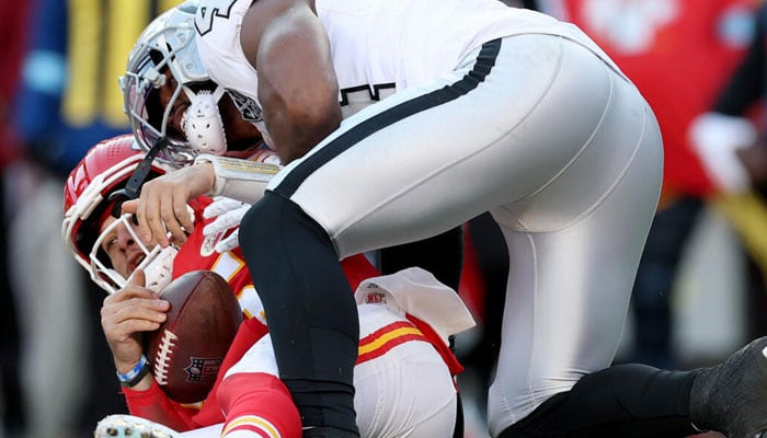 Kansas City quarterback Patrick Mahomes is sacked by KLavon Chaisson of the Las Vegas Raiders in the Chiefs 19-17 NFL victory over the Raiders. — AFP/File