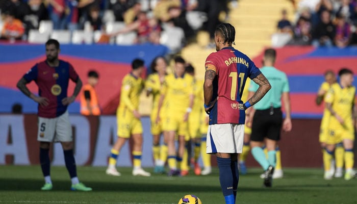 Barcelonas Brazilian forward Raphinha (right) reacts after Las Palmas scored their first goal. — AFP/File