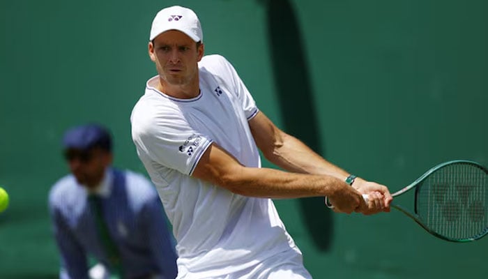 Polands Hubert Hurkacz in action during his second round match against Frances Arthur Fils at Wimbledon, 2024. — Reuters/File