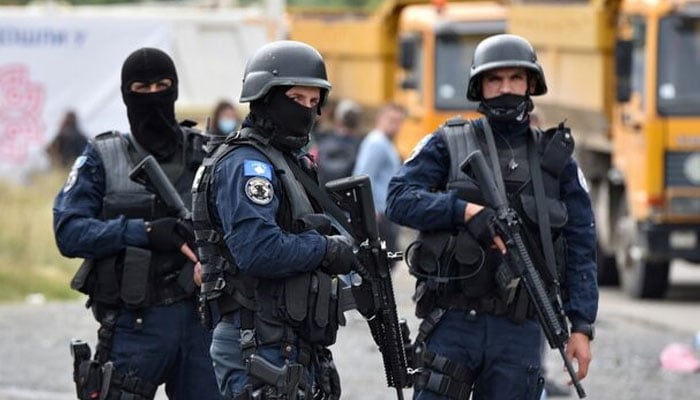 Kosovo special police officers are pictured as hundreds of Kosovo Serbs protest against a government ban on entry of vehicles with Serbian registration plates in Jarinje, Kosovo, September 21, 2021. — Reuters